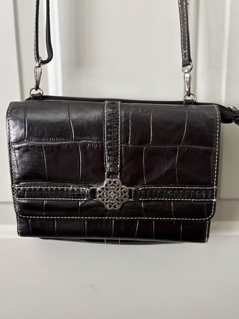 Brighton Black Croc-Embossed Crossbody with Decorative Silver Medallion